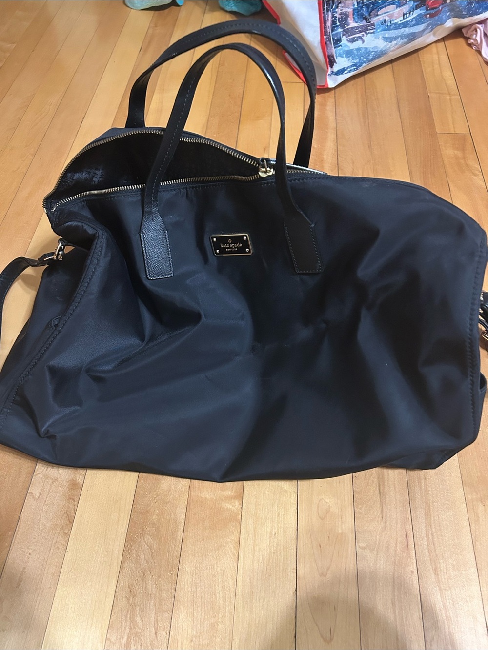 kate spade black nylon tote with gold logo plaque